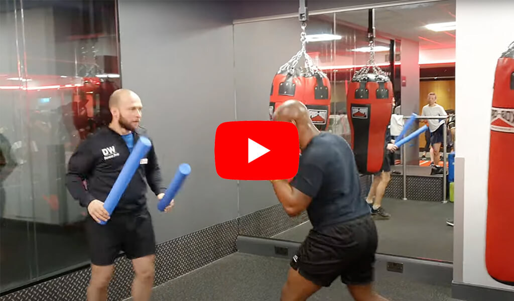 Boxing foam stick training enhances range, precision, and evasive techniques effectively.